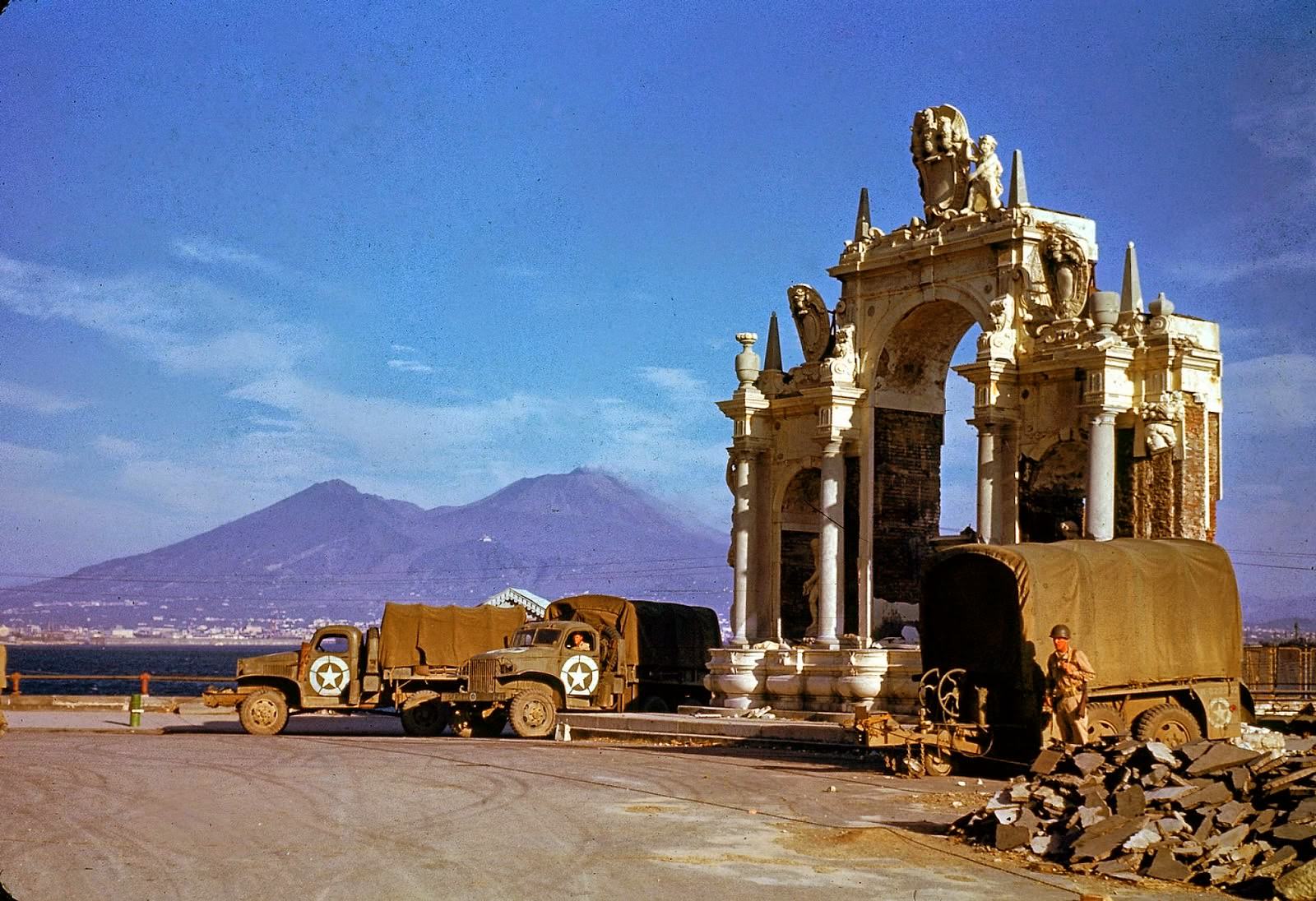 #36 American Army trucks parked next to the St. Lucia fountain in 1943.