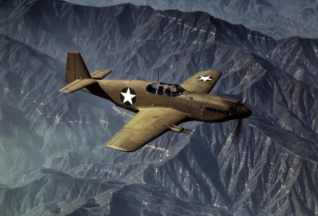 #140 P-51 “Mustang” fighter in flight, Inglewood, California, The Mustang, built by North American Aviation, Incorporated, is the only American-built fighter used by the Royal Air Force of Great Britain. Photo taken in October, 1942