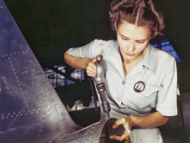 #146 Answering the nation’s need for womanpower, Mrs. Virginia Davis made arrangement for the care of her two children during the day and joined her husband at work in the Naval Air Base in Corpus Christi, Texas.