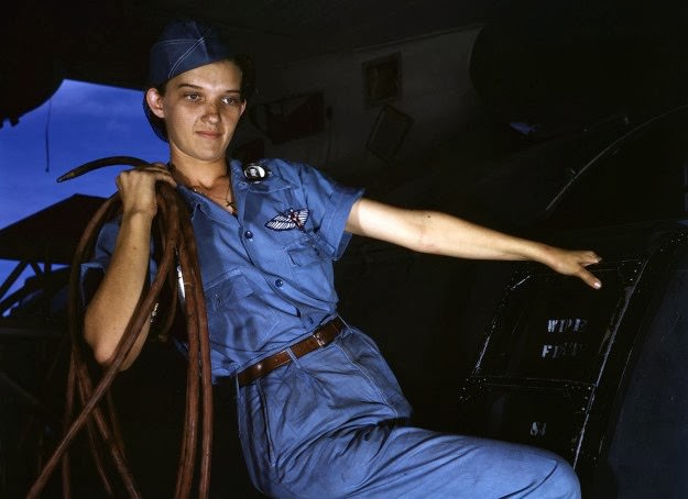 #155 With a woman’s determination, Lorena Craig takes over a man-size job in Corpus Christi, Texas. Before she came to work at the Naval air base she was a department store girl. Now she is a cowler under civil service. Photographed in August of 1942