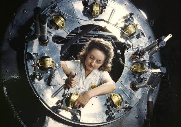 #157 Part of the cowling for one of the motors for a B-25 bomber is assembled in the engine department of North American Aviation’s Inglewood, California, plant, in October of 1942