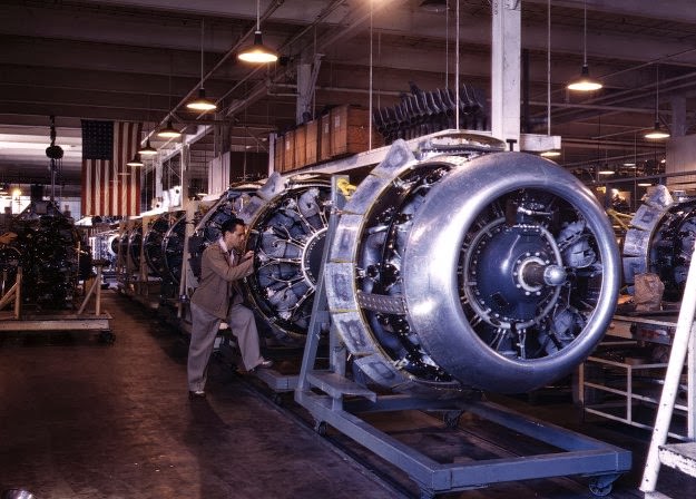 #158 Cowling and control rods are added to motors for North American B-25 bombers as they move down the assembly line at North American Aviation, in Inglewood, California, in October of 1942