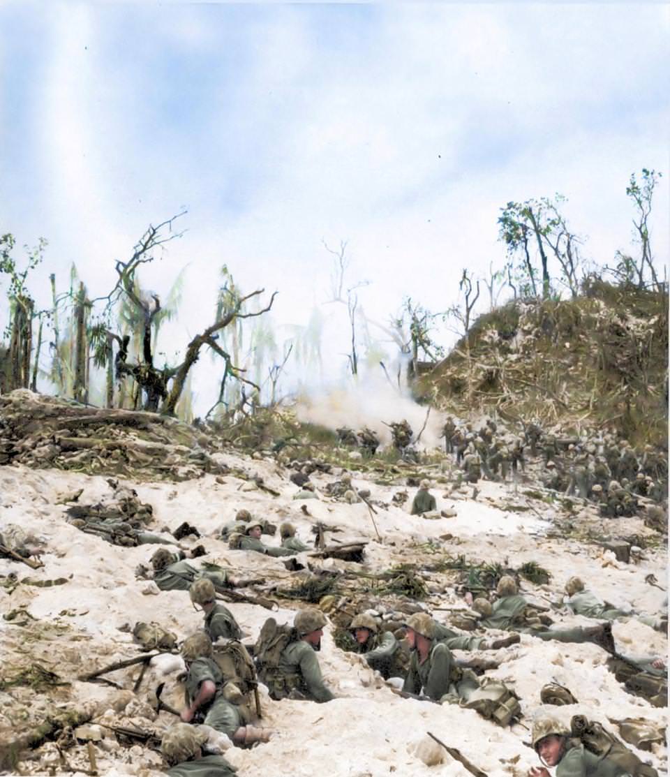 #46 Men of the US 1st Marine Division fighting just beyond White Beach, Peleliu in September 1944.