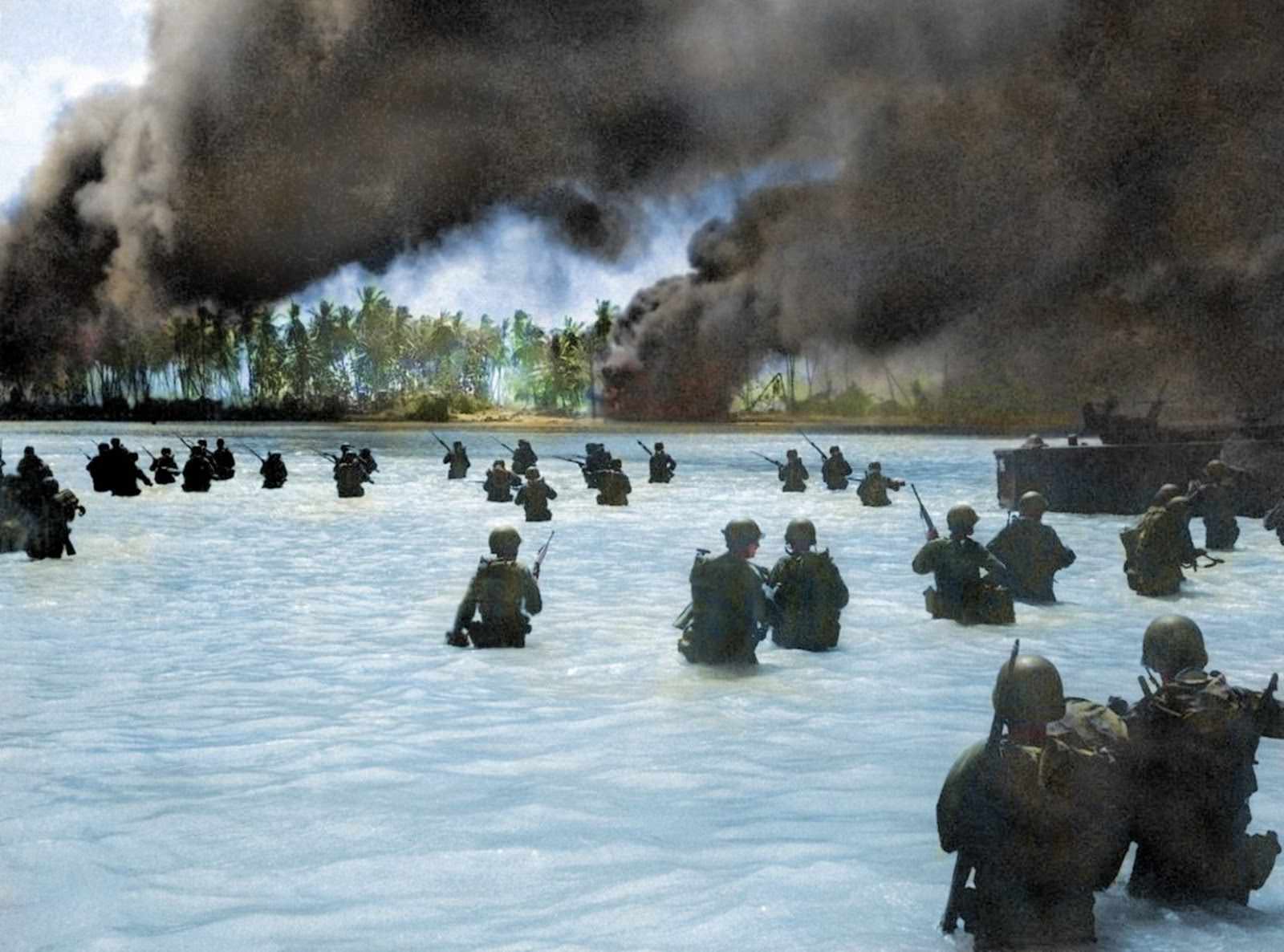#56 Men wade through the water near Butaritari Beach, Makin Atoll in November 1943.
