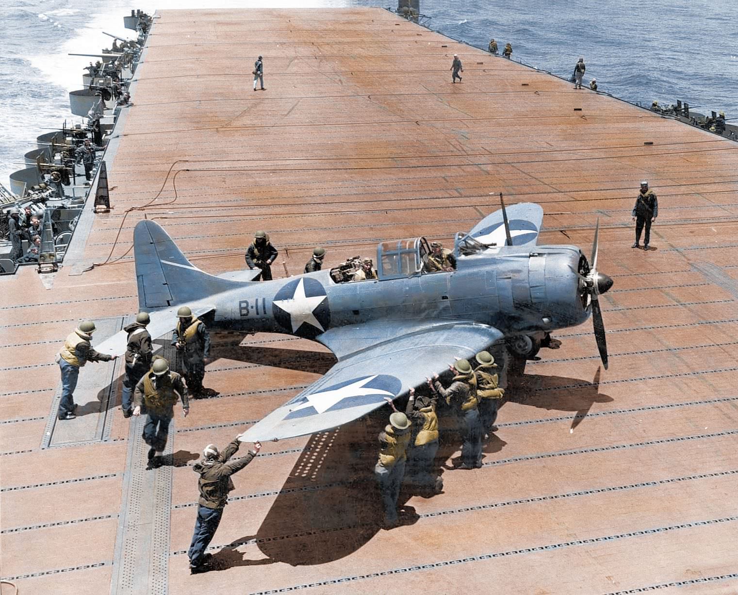 #65 A US Navy Douglas SBD-3 Dauntless of bombing squadron VB-8 on the deck of the aircraft carrier USS Hornet (CV-8) during the Battle of Midway in 1942.