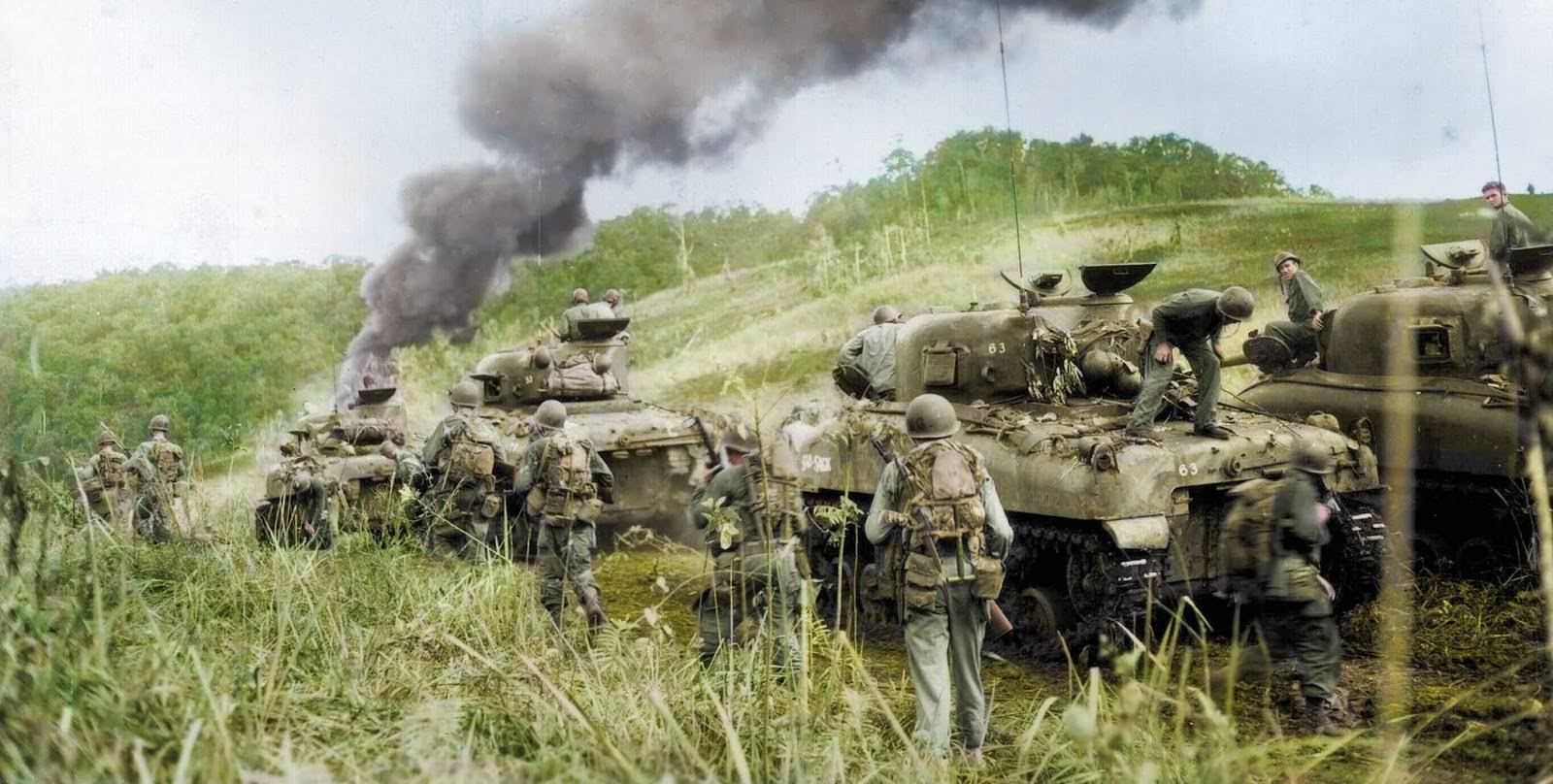 #66 Troops and their tanks in New Guinea in April 1944.