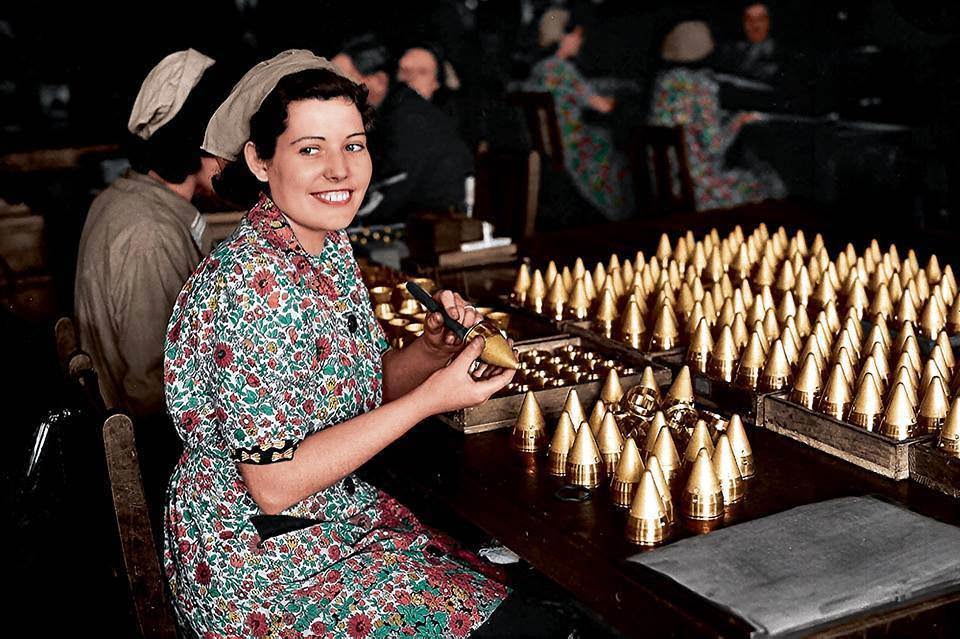 #81 Girls working on shell caps in a munitions factory, somewhere in England. 25th of May 1940