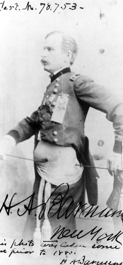 #26 Major General Henry Barnum shows off his war wounds. Barnum was shot through the side in 1862 and later received a Medal of Honor for his leadership.