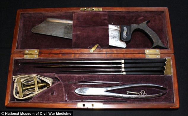 #41 Surgeons carried around kits like this one, equipped with an amputation saw, knives, forceps and other surgical equipment