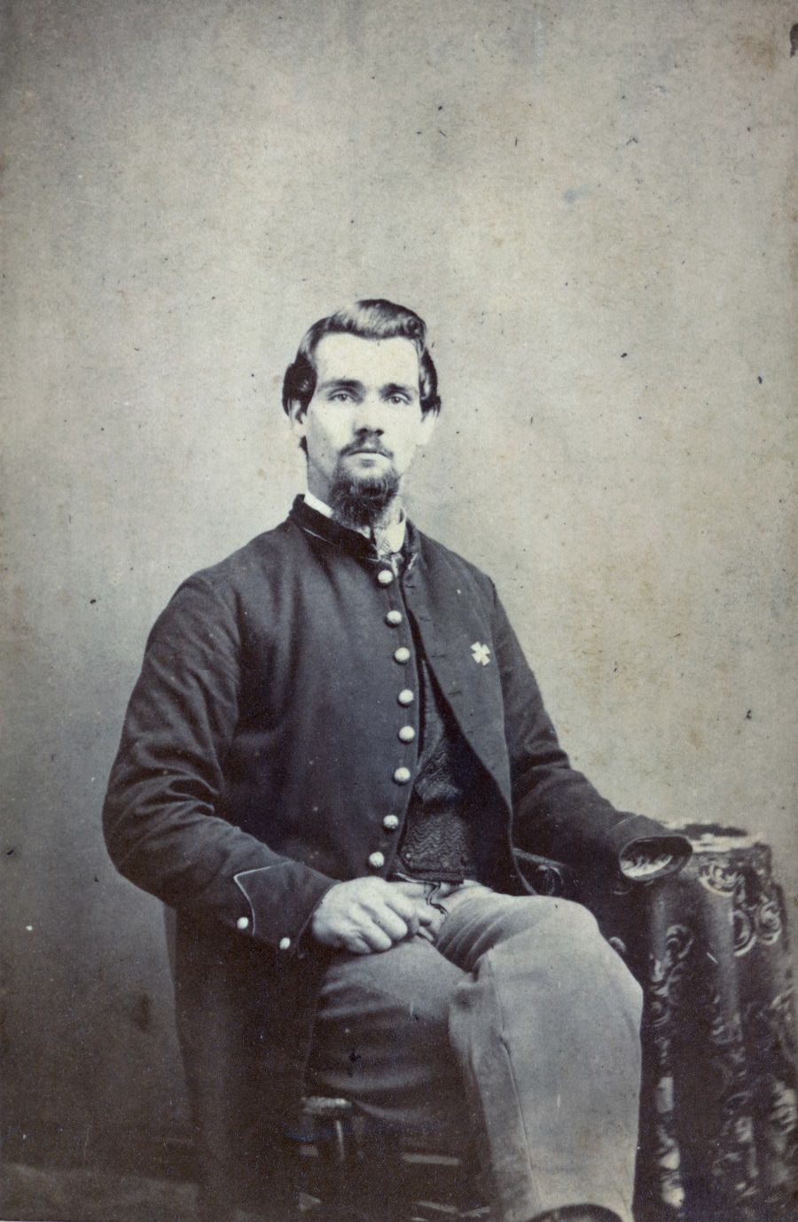 #7 Sergeant Thomas Plunkett of Co. E, 21st Massachusetts Infantry Regiment in uniform with American flag, 1863.