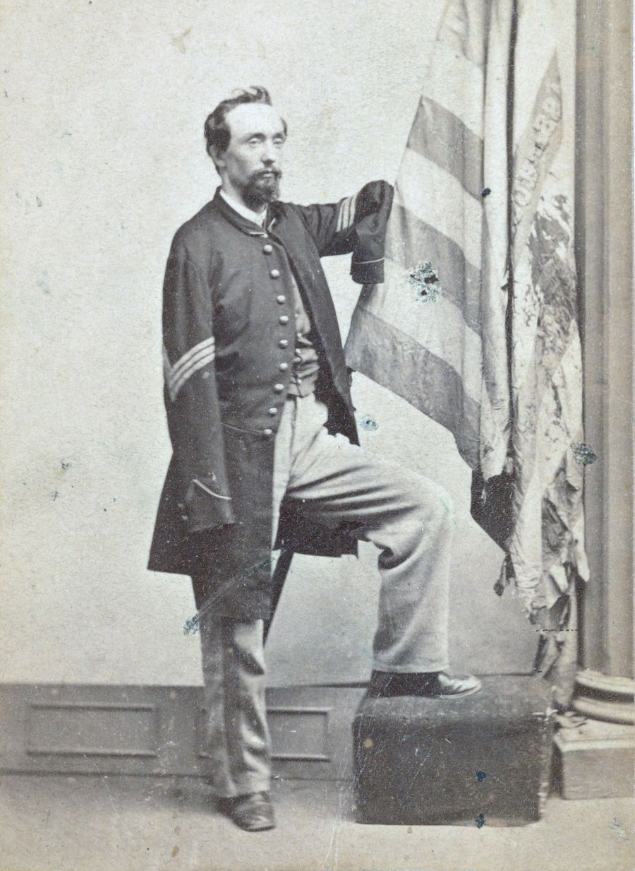 #6 Private Vernon Mosher of Co. F, 97th New York Infantry Regiment, in uniform, amputated hand visible, 1867.