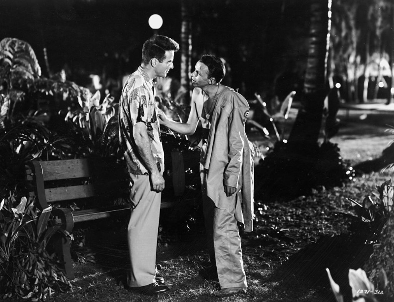 Montgomery Clift and Frank Sinatra talk in a still from the film ‘From Here to Eternity,’ 1953.