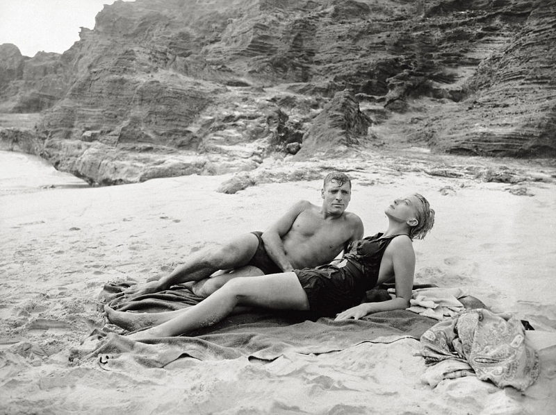 Burt Lancaster and Deborah Kerr lying together on the beach in a scene from the film ‘From Here to Eternity,’ 1953.