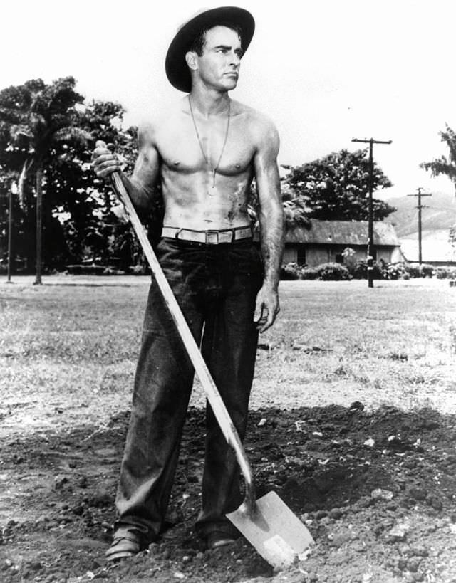 Montgomery Clift holds a shovel in a scene from the film ‘From Here to Eternity,’ 1953.