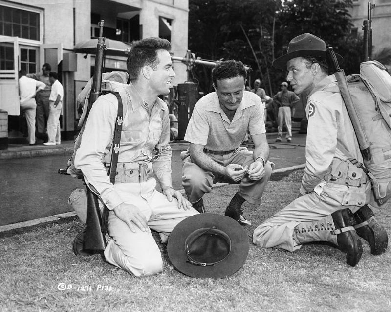 Fred Zinnemann directing Montgomery Clift and Frank Sinatra on the set of the film ‘From Here to Eternity,’ 1953.