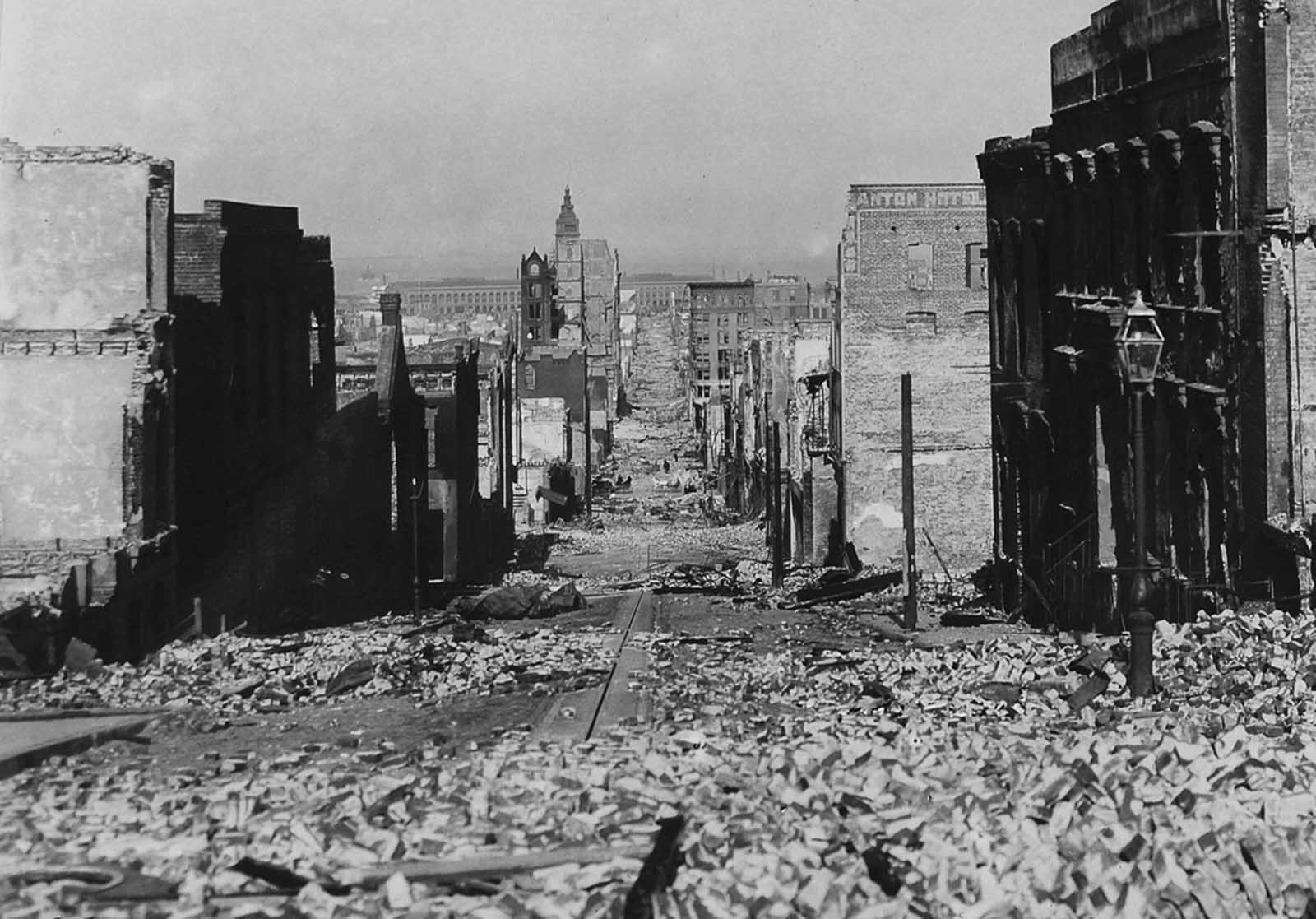 #40 After the disaster, looking down Sacramento Street, from Nob Hill, with the Ferry Building in background.