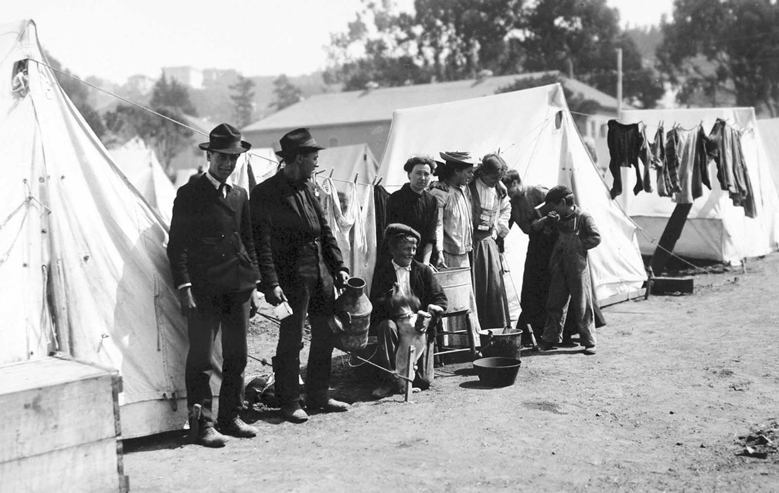 #51 Families take refuge in tents set up in green spaces and parks across the city.