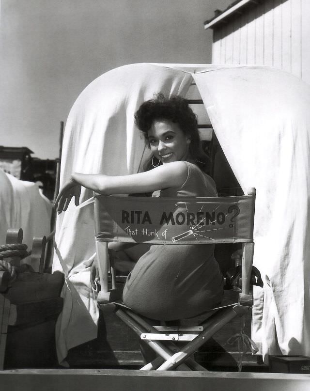 #10 Rita Moreno on the set of ‘Untamed,’ 1955.