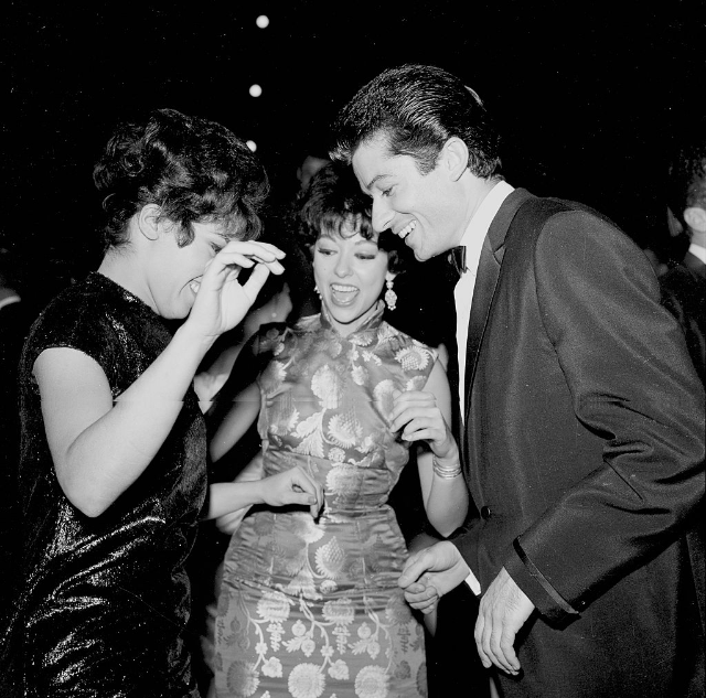 #40 Rita Moreno and George Chakiris attend an event in Los Angeles, circa 1961.