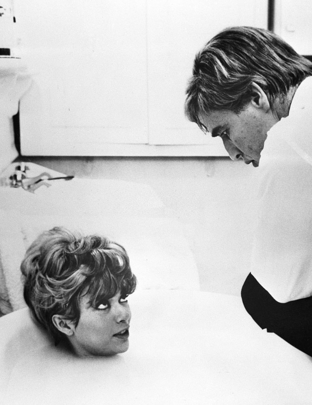 #44 Rita Moreno in a tub chatting with Marlon Brando during the filming of ‘The Night of the Following Day,’ Lettouquet, France, December 1967.