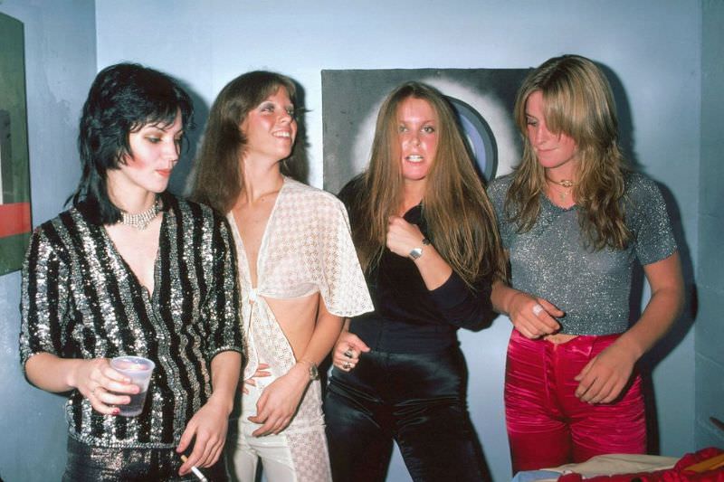 #20 The Runaways (L-R Joan Jett, Jackie Fox, Lita Ford, Sandy West) backstage at CBGB’s in New York on August 2, 1976