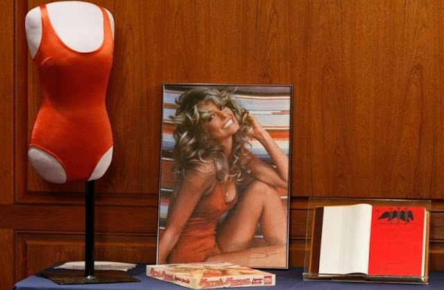 In 2011, two years after her death, her husband, Ryan O’Neil, donated the iconic red swimsuit and a copy of her poster to the Smithsonian National Museum of American History.