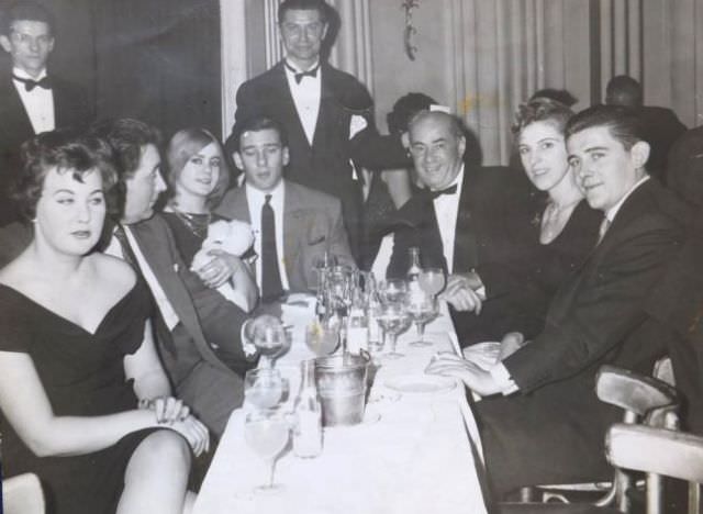 #37 Frances Shea and gangster Reggie Kray (third and fourth from left) with friends at a London nightclub, 1962