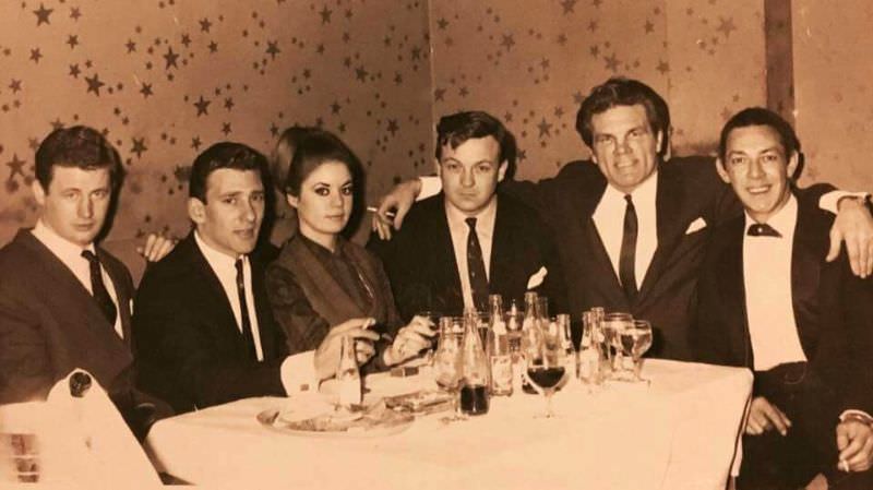 #15 Frances Shea and gangster Reggie Kray with friends at a London nightclub, 1962