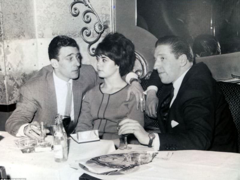 #38 Frances Shea and gangster Reggie Kray with friends at a London nightclub, 1962