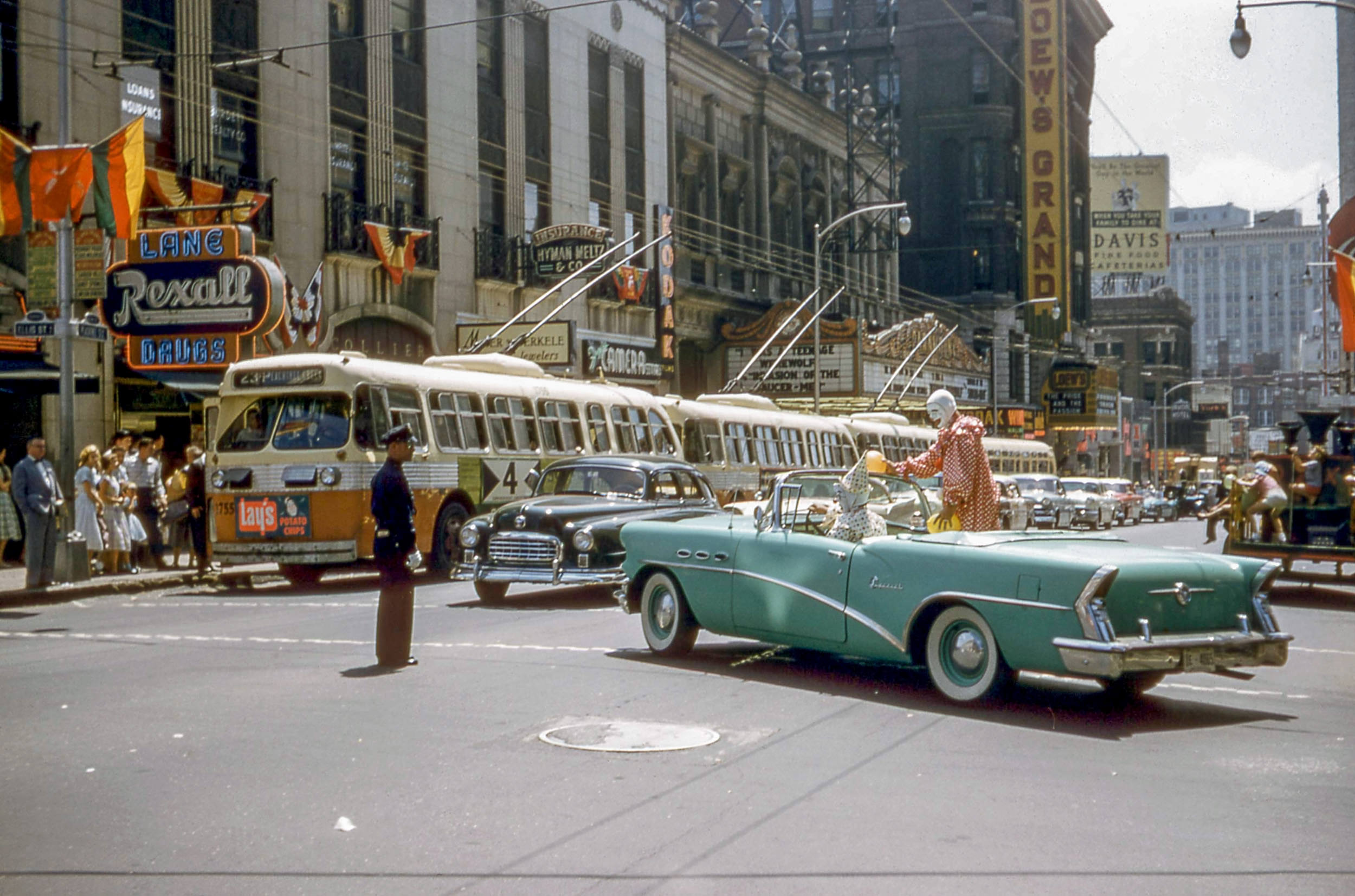 #1 Clowns in a car for the Shriners’ Annual Convention on Peachtree St. NW at Ellis St NE in Atlanta, August 30, 1957