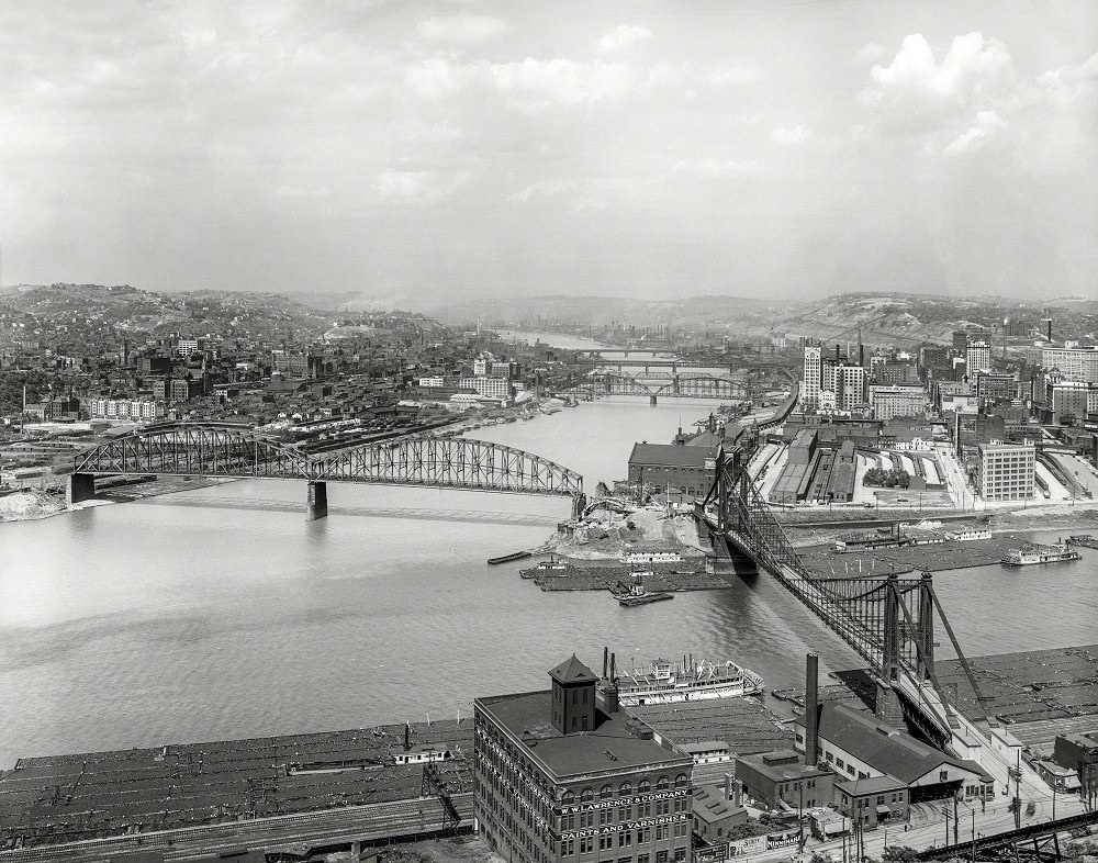 Coal barges at ‘The Point’ Confluence of Allegheny and Monongahela at start of Ohio River, Pittsburgh, 1912