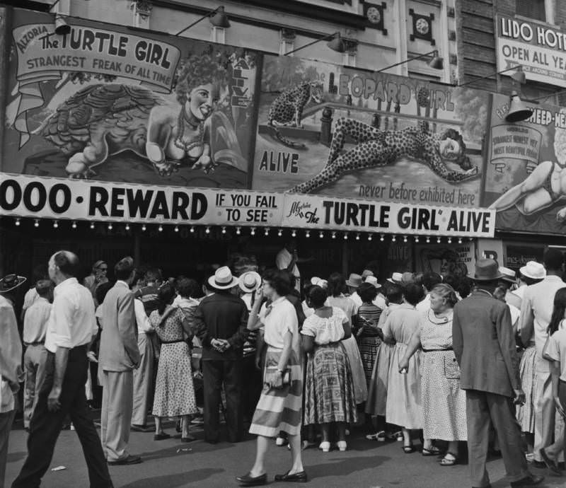 #46 People standing in line to see a “freak” show in Coney Island