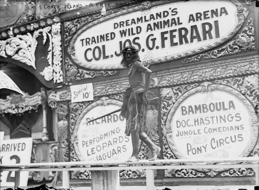 A sideshow performer brings in the crowd to Coney Island’s Dreamland Trained Wild Animal Arena for a show in New York, New York. Early 1910s