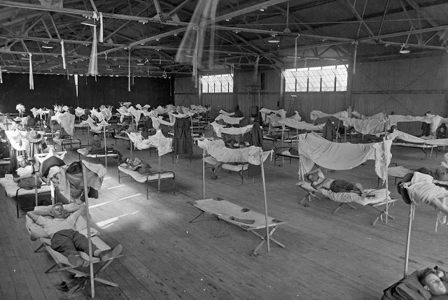 Convalescing influenza patients, isolated due to an overcrowded hospital, stay at the U.S. Army’s Eberts Field facilities in Lonoke, Arkansas, in 1918.