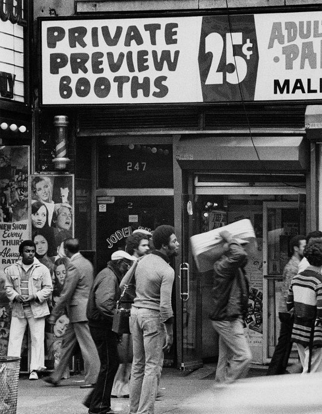 A sign offers ‘Private Preview Booths’ at a peep show, New York City, circa 1978.