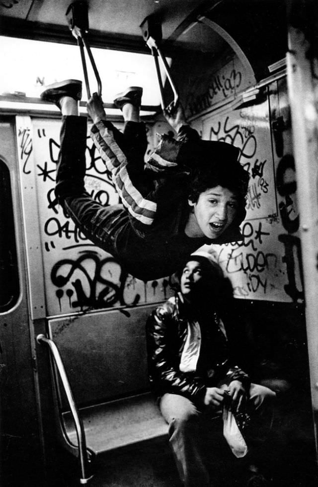 A child prostitute and his friend in the subway, heading home in the Bronx after a night hustling in Times Square.