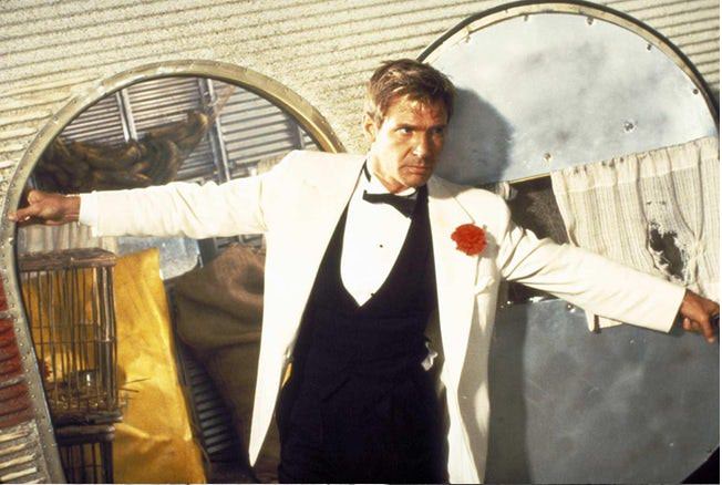 #7 Young Harrison Ford Wearing Tux with Red Flower