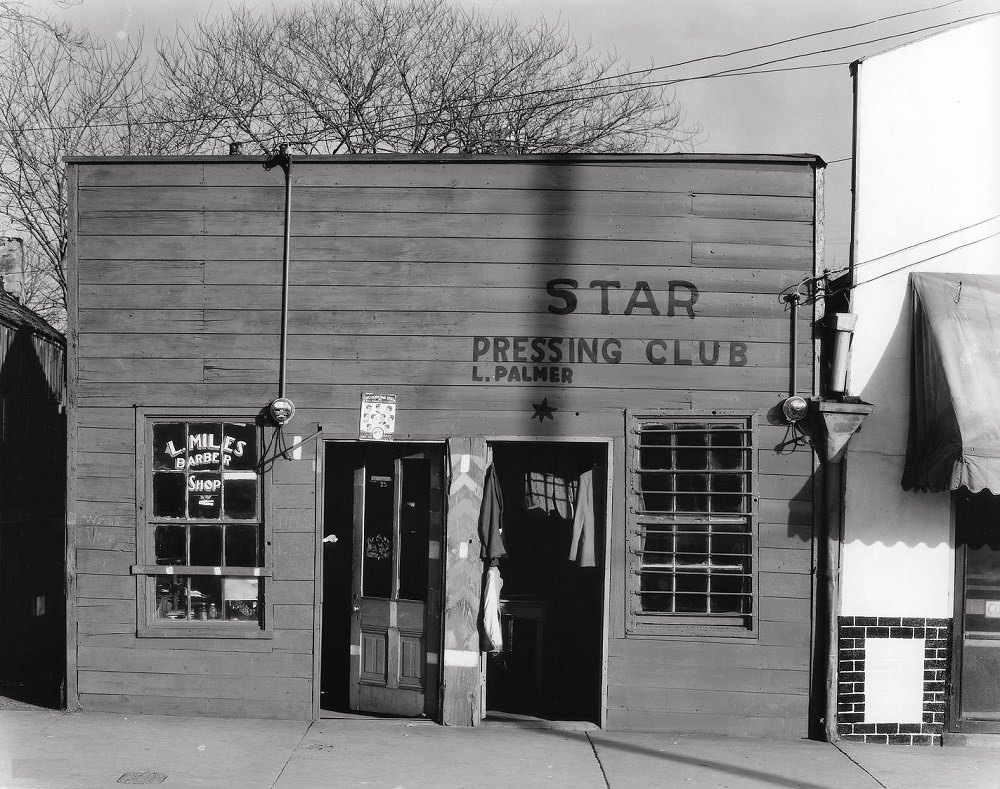 #12 Vicksburg Negroes and shop front, May 1936