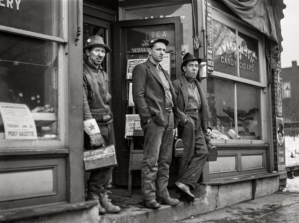#1 Employees of American Bridge Company (United States Steel) waiting for the bus, Ambridge, Pennsylvania, January 1941