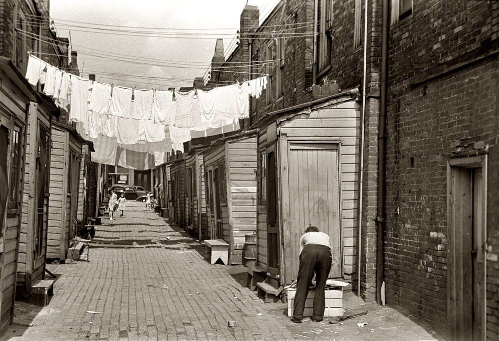 #11 Back alley showing housing conditions in Ambridge, Pennsylvania, July 1938