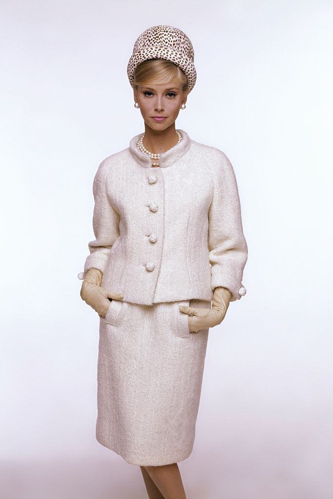 #32 Model in chalk white tweed Ben Zuckerman suit, ivory Viola Weinberger gloves, Vogue 1963