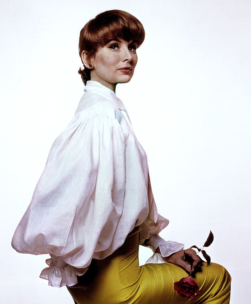 #39 Suzy Parker in Tom Jones shirt by Jax and yellow Jax pants, Vogue 1964
