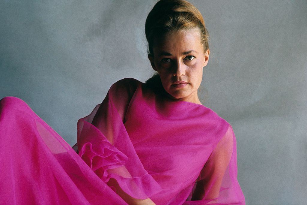 #60 French actress Jeanne Moreau wearing a chiffon gown, Vogue 1965