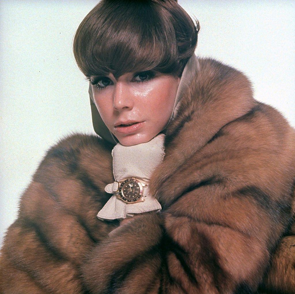 #75 Fashion model in natural golden Russian sable coat, Vogue 1966
