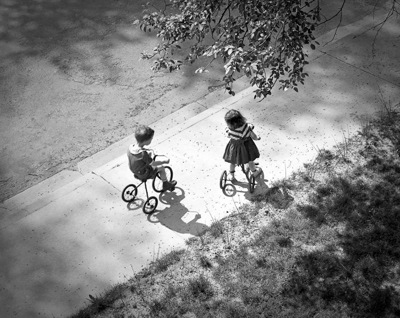 #30 Kids riding tricycles, May 1939