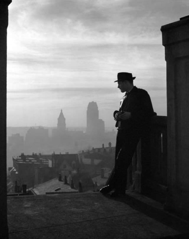 #1 Young man contemplates downtown Cincinnati’s skyline, Feb. 11th, 1938