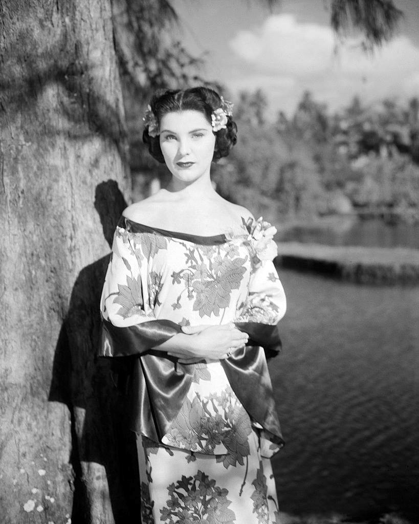 #39 Debra Paget wearing a silk, oriental-style dress, 1950