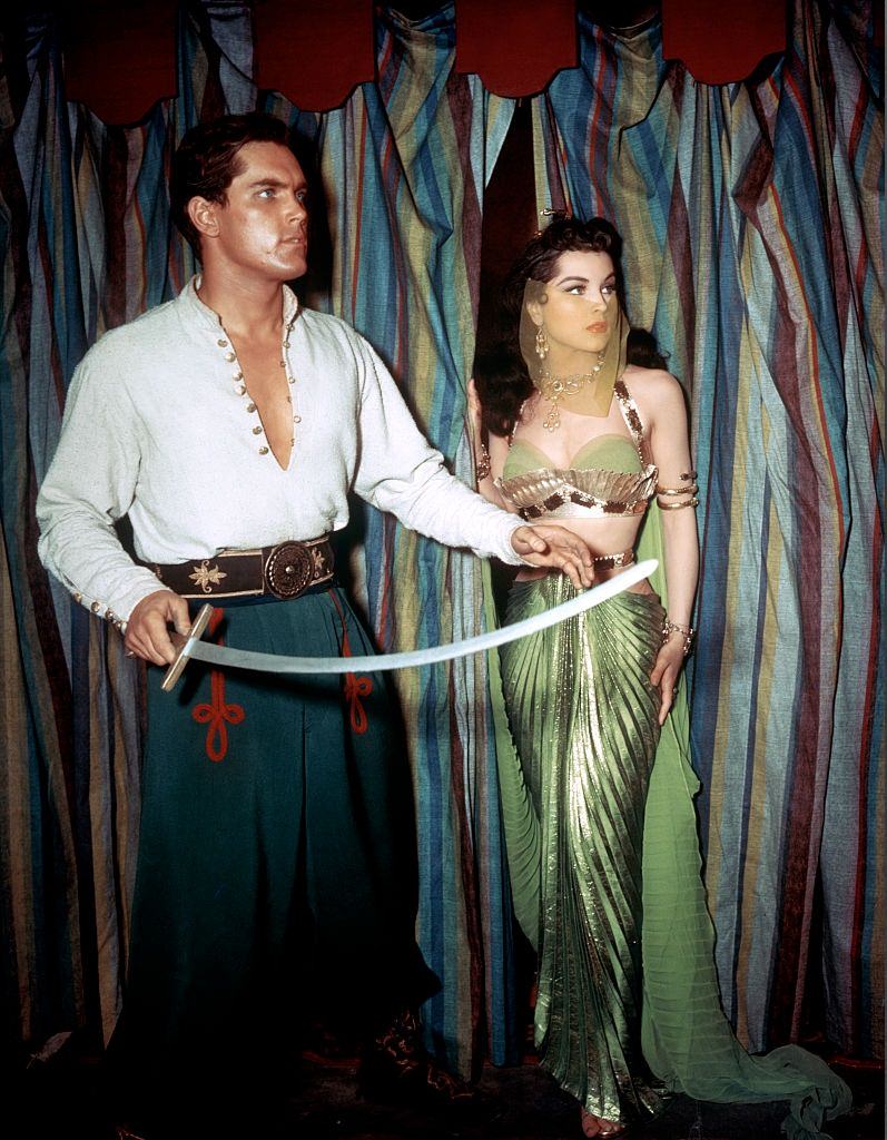 #42 Debra Paget with Jeffrey Hunter on the set of Princess of the Nile directed by Harmon Jones.