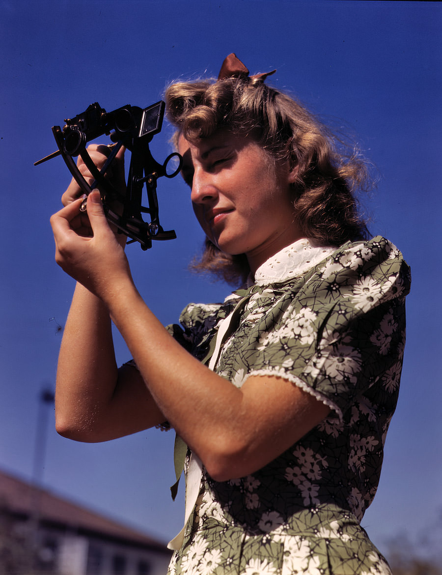 #43 Learning how to determine latitude by using a sextant is Senta Osoling, student at Polytechnic High School, Los Angeles, September 1942