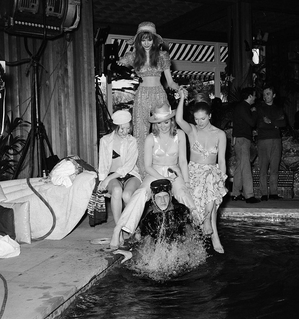 Madeline Smith with Pippa Steel, Janet Key, Geraldine de Sancha and John Hurt during the production of “Forbush and the Penguins”, 1970